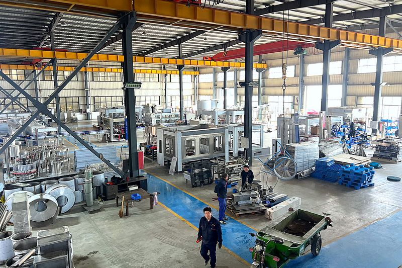 BevSystem workshop with assembly line and technicians